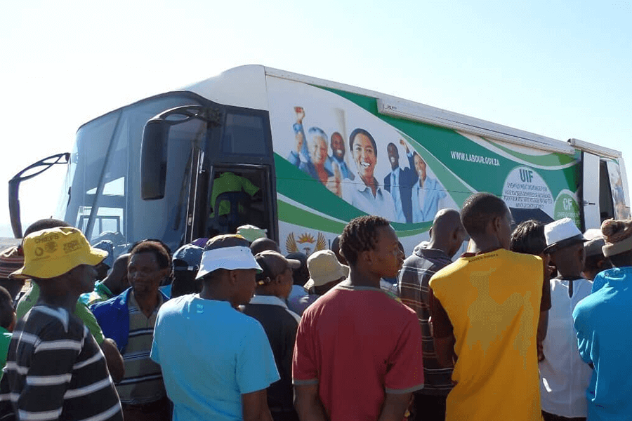 Department of labour mobile outside helping people